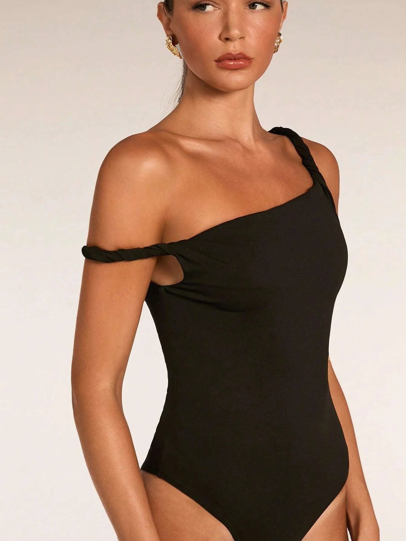 Women's One-Shoulder Twist Strap Bodysuit